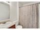 Well-maintained bathroom with a vanity, mirror, and shower-tub combination at 917 Congressional Way, Shelbyville, IN 46176