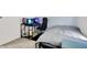 Small bedroom with desk set up, overhead lighting and simple carpeted flooring at 917 Congressional Way, Shelbyville, IN 46176