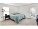 Well-lit bedroom featuring carpet and easy access to the private back porch at 917 Congressional Way, Shelbyville, IN 46176