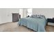 Airy bedroom features neutral walls, carpet, and an inviting atmosphere at 917 Congressional Way, Shelbyville, IN 46176
