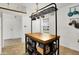 Kitchen featuring tile flooring, a butcher block island, and overhead pot/mug rack at 917 Congressional Way, Shelbyville, IN 46176