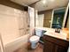 Bathroom featuring a shower over tub with vanity and toilet at 93 Lookout Ridge Dr # 24U, Columbus, IN 47201