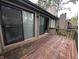 Exterior deck with wood railing overlooking the surrounding lush trees and nature at 93 Lookout Ridge Dr # 24U, Columbus, IN 47201