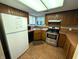 Efficient kitchen with stainless steel appliances and ample cabinet space at 93 Lookout Ridge Dr # 24U, Columbus, IN 47201