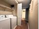 Laundry room featuring washer and dryer set, folding door and tile flooring at 93 Lookout Ridge Dr # 24U, Columbus, IN 47201