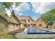 Backyard with inground pool, multiple structures, and mature trees at 101 Applecross Dr, Brownsburg, IN 46112