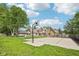 Large backyard with basketball court, inground pool, and mature trees at 101 Applecross Dr, Brownsburg, IN 46112