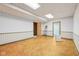 Tiled basement with recessed lighting, neutral walls, and wood trim at 101 Applecross Dr, Brownsburg, IN 46112