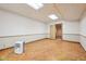 Neutral basement with tile flooring, recessed lighting, and white walls at 101 Applecross Dr, Brownsburg, IN 46112