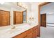 Bathroom featuring double vanity, and wood trim at 101 Applecross Dr, Brownsburg, IN 46112