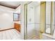 Bright bathroom featuring a glass shower, tile, and custom built cabinetry at 101 Applecross Dr, Brownsburg, IN 46112
