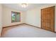 Cozy bedroom with a window and door at 101 Applecross Dr, Brownsburg, IN 46112