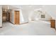 Large finished room with vaulted ceiling, skylight, carpet, dormer window, and access to adjacent spaces at 101 Applecross Dr, Brownsburg, IN 46112