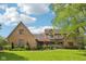 Charming brick home featuring an attached garage, lush landscaping, and inviting curb appeal at 101 Applecross Dr, Brownsburg, IN 46112