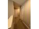 Second floor hallway with carpeted flooring and neutral walls and doors at 10931 N Longbranch St, Monrovia, IN 46157