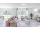 Open-concept living room with a view to the backyard, perfect for relaxation and entertaining at 1107 Stubble Run, Danville, IN 46122