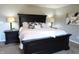 Bright main bedroom featuring a large bed, two nightstands, and contemporary decor at 11155 Funny Cide Dr, Noblesville, IN 46060