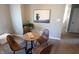 Cozy sitting area with a small table, chairs, and a stylish decor at 11155 Funny Cide Dr, Noblesville, IN 46060