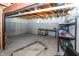 Unfinished basement with exposed beams and utilities, providing ample storage at 11818 Bellhaven Dr, Fishers, IN 46038