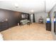 Spacious basement featuring a comfortable seating area, plush carpet, and a modern decor, perfect for relaxation at 11818 Bellhaven Dr, Fishers, IN 46038