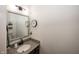 Half bath with granite countertop and modern fixtures at 11818 Bellhaven Dr, Fishers, IN 46038
