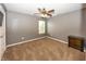 Bedroom featuring plush carpet, neutral walls, and a window providing abundant natural light at 11818 Bellhaven Dr, Fishers, IN 46038