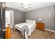 Bedroom showcases a comfortable bed, plush carpet, and a ceiling fan to create a cozy retreat at 11818 Bellhaven Dr, Fishers, IN 46038