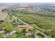 Beautiful aerial view of the property, lush green surroundings, and charming neighborhood at 1242 W Huntsville Rd, Pendleton, IN 46064