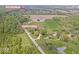 Lovely aerial view of the property highlighting its expansive land and nearby Hickory Hills East at 1242 W Huntsville Rd, Pendleton, IN 46064