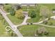 An aerial view of a well-maintained lawn surrounding a charming home, complete with a private driveway and scenic views at 1242 W Huntsville Rd, Pendleton, IN 46064