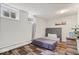 Cozy bedroom features hardwood floors, natural light, and a comfortable day bed at 1242 W Huntsville Rd, Pendleton, IN 46064
