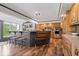 Spacious kitchen with wooden cabinets, stainless steel appliances, and an island with seating for cooking and gathering at 1242 W Huntsville Rd, Pendleton, IN 46064