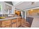 Cozy kitchen with wooden cabinets, granite countertops, and natural light, creating a warm and inviting space at 1242 W Huntsville Rd, Pendleton, IN 46064