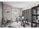 Bright home office with natural light, neutral colors and comfortable seating at 1242 W Huntsville Rd, Pendleton, IN 46064