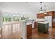 Open kitchen featuring an island, and views of the backyard at 12739 Kiawah Dr, Carmel, IN 46033