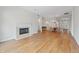 Spacious living room with hardwood floors, fireplace, and open layout at 12739 Kiawah Dr, Carmel, IN 46033