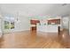 Open living space with hardwood floors, recessed lighting and kitchen access at 12739 Kiawah Dr, Carmel, IN 46033