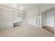 Well-lit office featuring custom built-ins and neutral carpet at 12739 Kiawah Dr, Carmel, IN 46033