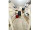 Organized walk-in closet with shelving and hanging space for optimal storage and clothing organization at 12974 Shandon Ln, Fishers, IN 46038