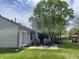 Cozy backyard patio area with outdoor seating, perfect for relaxation and entertaining at 12974 Shandon Ln, Fishers, IN 46038