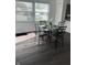 Bright dining area with a marble table set for four, with lots of natural light at 1327 Union St, Columbus, IN 47201