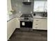 Kitchen showcases stainless steel appliances, granite countertops, and a stylish backsplash for an appealing and functional cooking space at 1327 Union St, Columbus, IN 47201
