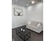 Bright living room featuring a gray sofa, black coffee table and decorative bull artwork at 1327 Union St, Columbus, IN 47201