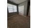 Bedroom with closet, carpet flooring, window, and neutral walls at 1380 Fairmount Dr, Greenfield, IN 46140