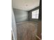 Bedroom with gray walls, neutral carpet and window bringing in natural light at 1380 Fairmount Dr, Greenfield, IN 46140