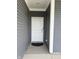 Inviting front entrance with a white door and matching trim at 1380 Fairmount Dr, Greenfield, IN 46140