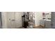 Functional laundry room equipped with modern appliances and storage solutions, providing convenience at 142 Winding Brook Way, Pendleton, IN 46064