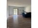 Cozy living room has recessed lighting and access to the outdoors, offering a relaxing space at 142 Winding Brook Way, Pendleton, IN 46064