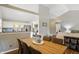 Inviting dining area with hardwood floors and plenty of natural light at 14634 Village Park East Dr, Carmel, IN 46033