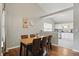 Cozy dining area with table for six at 14634 Village Park East Dr, Carmel, IN 46033